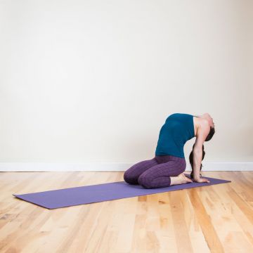 Ease a Throbbing Headache With These Soothing Yoga Poses